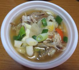 豆腐、大根、人参、ねぎなどたくさんの野菜が入ったサッタロウのどぶ汁の写真