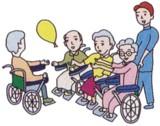 風船を渡して交流する車椅子の高齢者4人と男性ヘルパーの画像