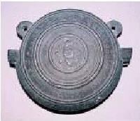 銅製鰐口（元禄九年鋳造）の写真